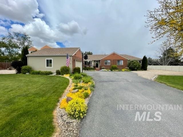 14924 Hillside Dr, Caldwell, ID 83607 - view of front of house with asphalt driveway
