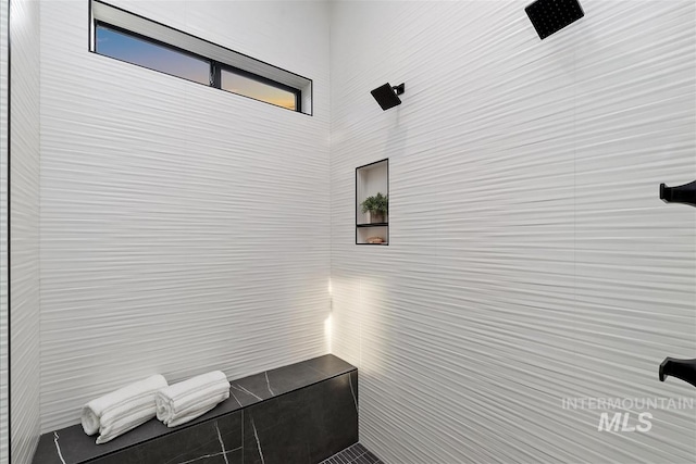 9891 W Napier Ct, Star, ID 83669 - bathroom with tile walls and a tile shower