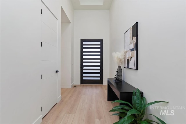 9891 W Napier Ct, Star, ID 83669 - entryway featuring baseboards and light wood-style flooring