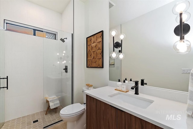 9891 W Napier Ct, Star, ID 83669 - full bathroom with vanity, a stall shower, and toilet