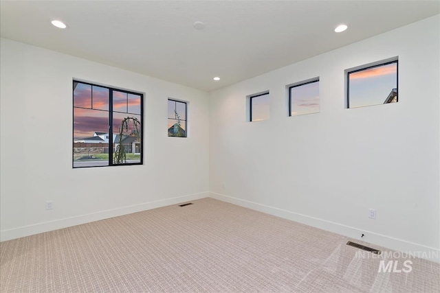 9891 W Napier Ct, Star, ID 83669 - carpeted spare room with recessed lighting, baseboards, and visible vents
