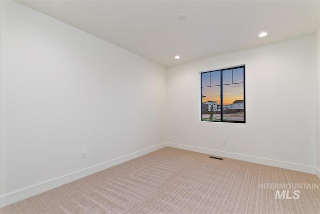 9891 W Napier Ct, Star, ID 83669 - unfurnished room featuring baseboards, light carpet, recessed lighting, and visible vents