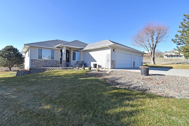 view of front of home with roof with shingles, concrete driveway, a front lawn, a garage, and stone siding