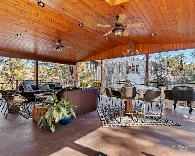 view of patio featuring outdoor dining area, outdoor lounge area, and ceiling fan