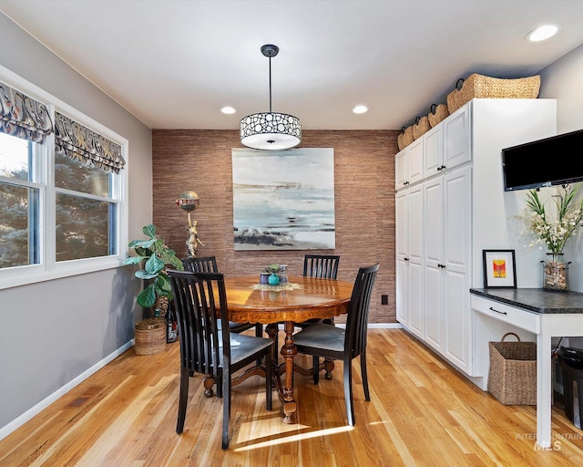 dining space with light wood-style flooring, visible vents, baseboards, and recessed lighting