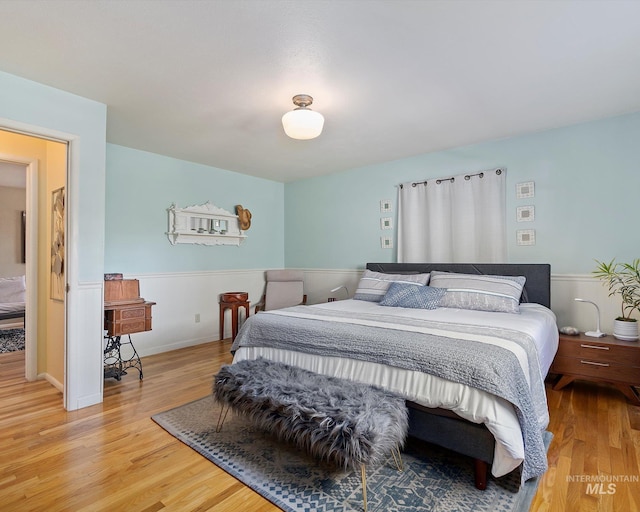 bedroom featuring light wood finished floors