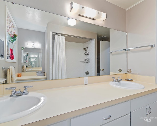 full bath featuring vanity and a shower with shower curtain