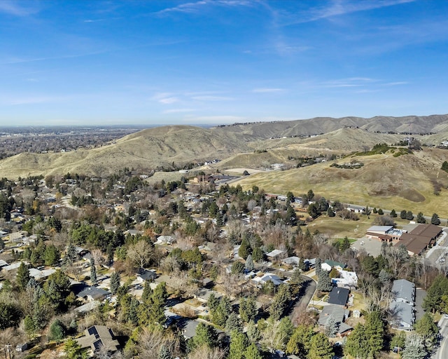 birds eye view of property featuring a mountain view