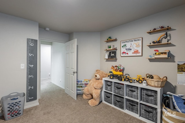 playroom featuring carpet and baseboards