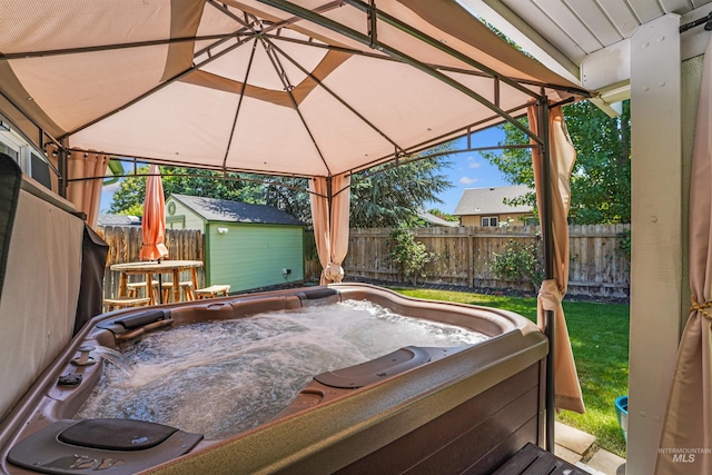 13725 W Fig St, Boise, ID 83713 - deck featuring a gazebo, a hot tub, and a fenced backyard