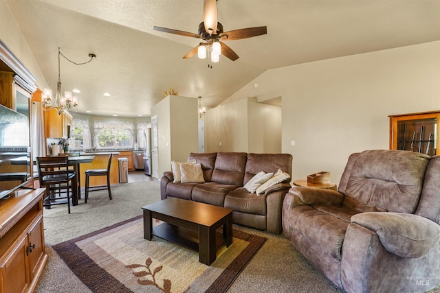 13725 W Fig St, Boise, ID 83713 - living area with light carpet, ceiling fan, vaulted ceiling, and a chandelier