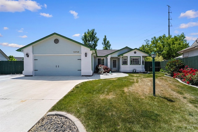 13725 W Fig St, Boise, ID 83713 - single story home with a garage, concrete driveway, and stucco siding