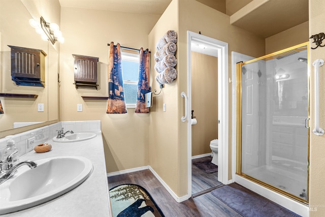 13725 W Fig St, Boise, ID 83713 - full bathroom featuring wood finished floors, a shower stall, and toilet