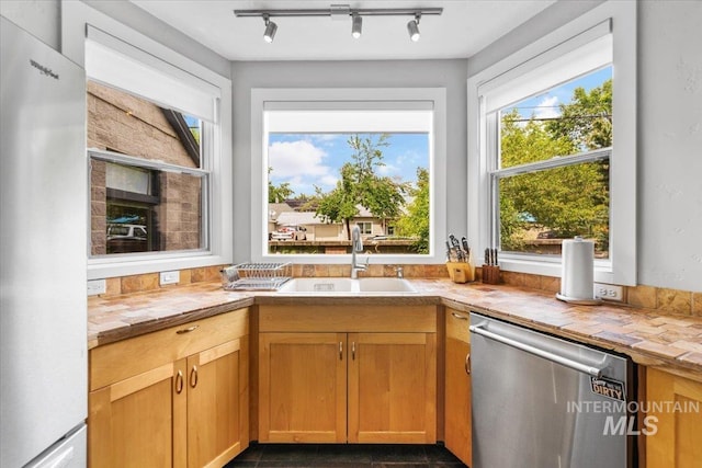kitchen featuring appliances with stainless steel finishes and sink