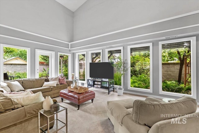 sunroom with vaulted ceiling