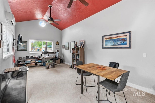carpeted home office with ceiling fan, vaulted ceiling, and an AC wall unit