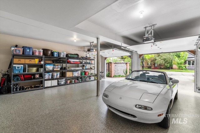 garage featuring a garage door opener