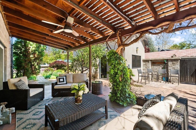 view of patio / terrace with outdoor lounge area, ceiling fan, and a pergola