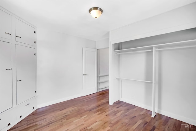 116 6th Ave E, Jerome, ID 83338 - unfurnished bedroom with light wood finished floors, baseboards, and a closet