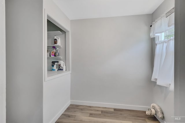 116 6th Ave E, Jerome, ID 83338 - corridor with light wood-style flooring and baseboards