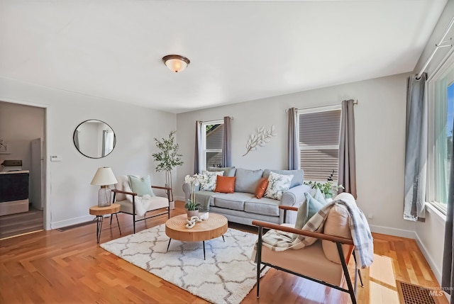 116 6th Ave E, Jerome, ID 83338 - living room with baseboards and light wood-type flooring