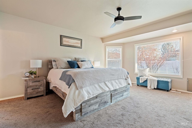 carpeted bedroom featuring ceiling fan and baseboards