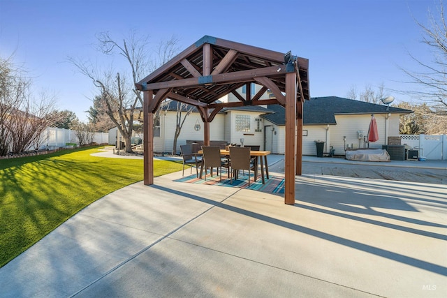 view of patio / terrace with a fenced backyard and a gazebo