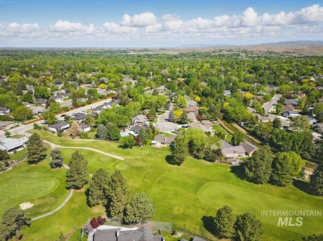 aerial perspective of suburban area with a local golf course
