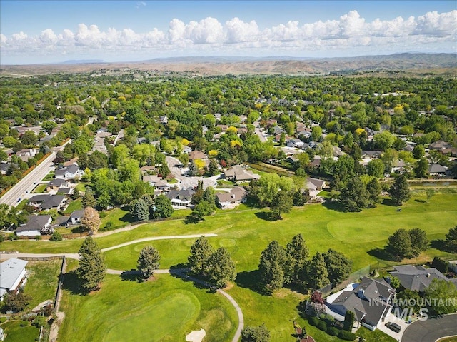 aerial perspective of suburban area with a golf course