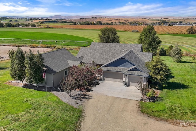 birds eye view of property featuring a rural view