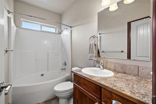 full bathroom with toilet, vanity, and bathtub / shower combination