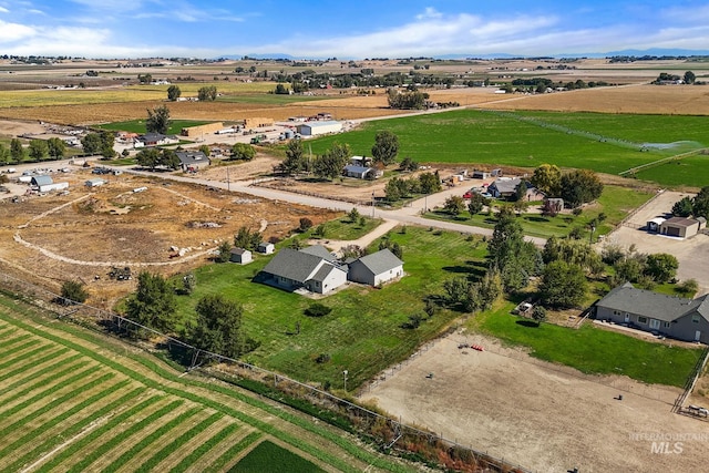 birds eye view of property featuring a rural view