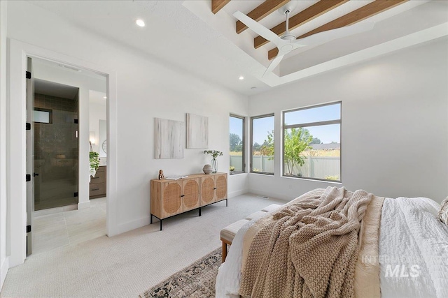 bedroom featuring ceiling fan, beam ceiling, and light carpet