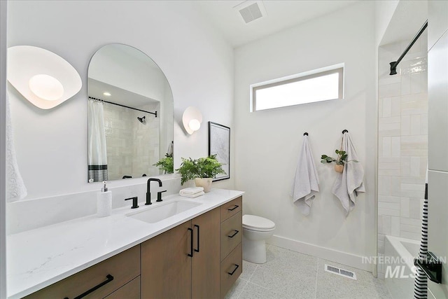 full bathroom featuring vanity, toilet, and shower / bath combo with shower curtain