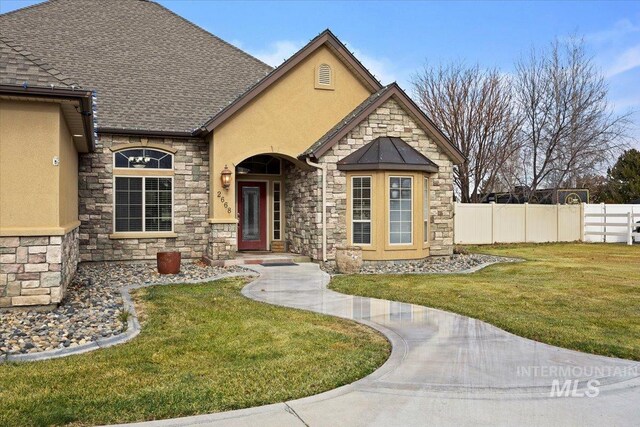 view of front of house with a front yard