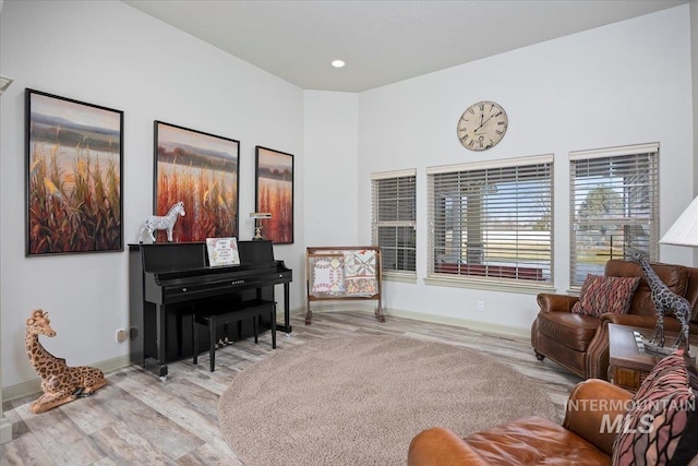 sitting room with light hardwood / wood-style flooring