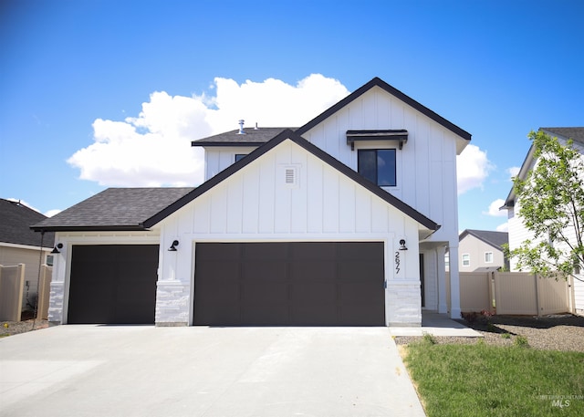 modern inspired farmhouse featuring a garage