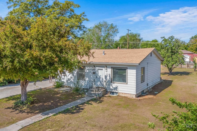349 Adams St, Twin Falls, ID 83301 - view of front of home featuring roof with shingles and a front yard