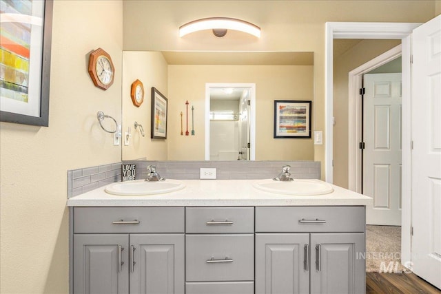 bathroom featuring wood-type flooring and vanity