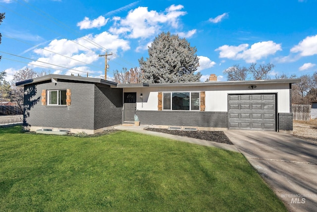 5338 W Spaulding St, Boise, ID 83705 - ranch-style home with an attached garage, a front lawn, concrete driveway, brick siding, and a chimney