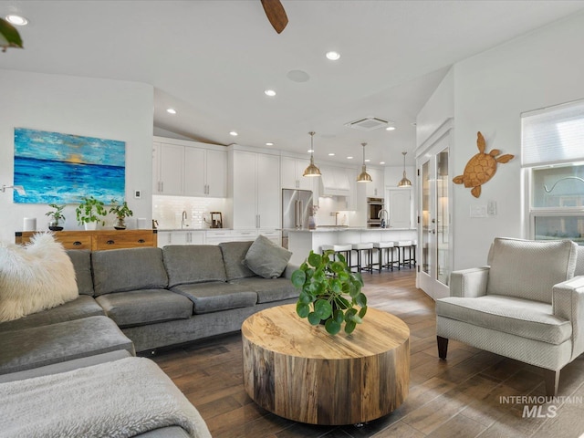 2510 N 24th St, Boise, ID 83702 - living room featuring dark wood finished floors, recessed lighting, and lofted ceiling