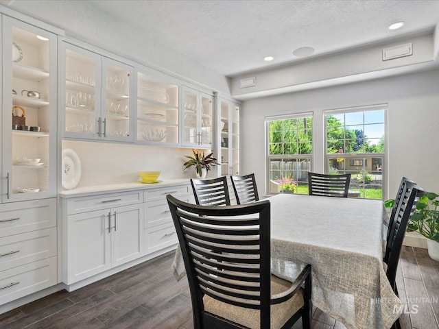 2510 N 24th St, Boise, ID 83702 - dining area featuring dark wood finished floors, a textured ceiling, and recessed lighting