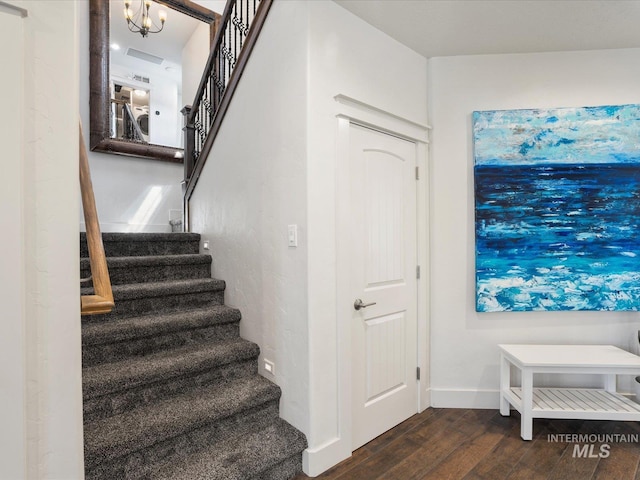 2510 N 24th St, Boise, ID 83702 - stairs with wood finished floors and a chandelier