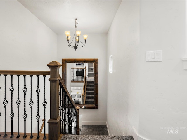 2510 N 24th St, Boise, ID 83702 - stairs with a chandelier and carpet flooring