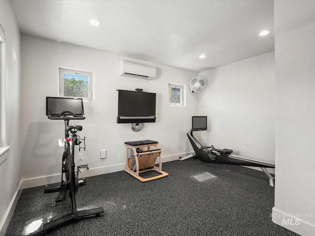 2510 N 24th St, Boise, ID 83702 - workout area featuring a wall mounted air conditioner, healthy amount of natural light, and recessed lighting