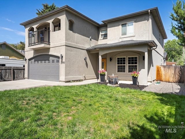 2510 N 24th St, Boise, ID 83702 - view of front of house with a balcony, stucco siding, a garage, and concrete driveway