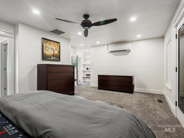 2510 N 24th St, Boise, ID 83702 - bedroom with a wall unit AC, carpet, a textured ceiling, recessed lighting, and a ceiling fan