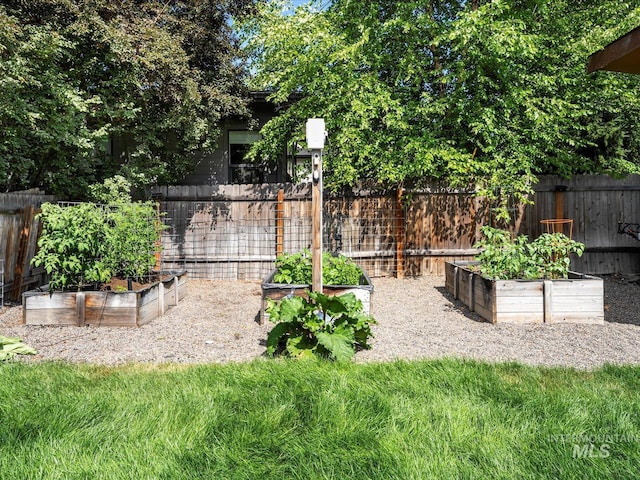 2510 N 24th St, Boise, ID 83702 - view of yard featuring a vegetable garden