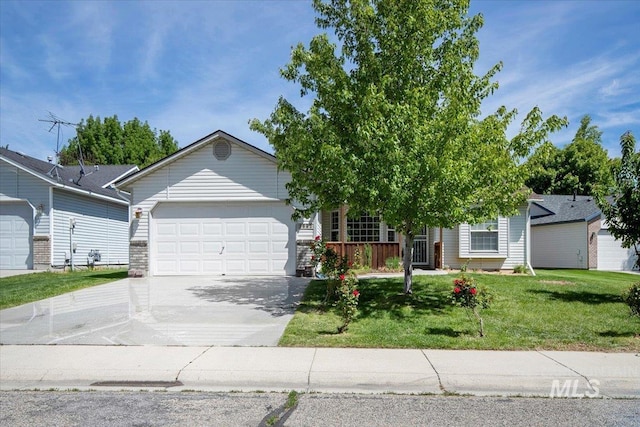 5692 S Flax Pl, Boise, ID 83716 - view of front facade featuring a garage, concrete driveway, and a front yard