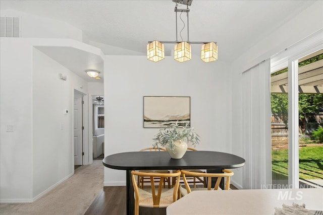 5692 S Flax Pl, Boise, ID 83716 - dining space featuring baseboards and wood finished floors